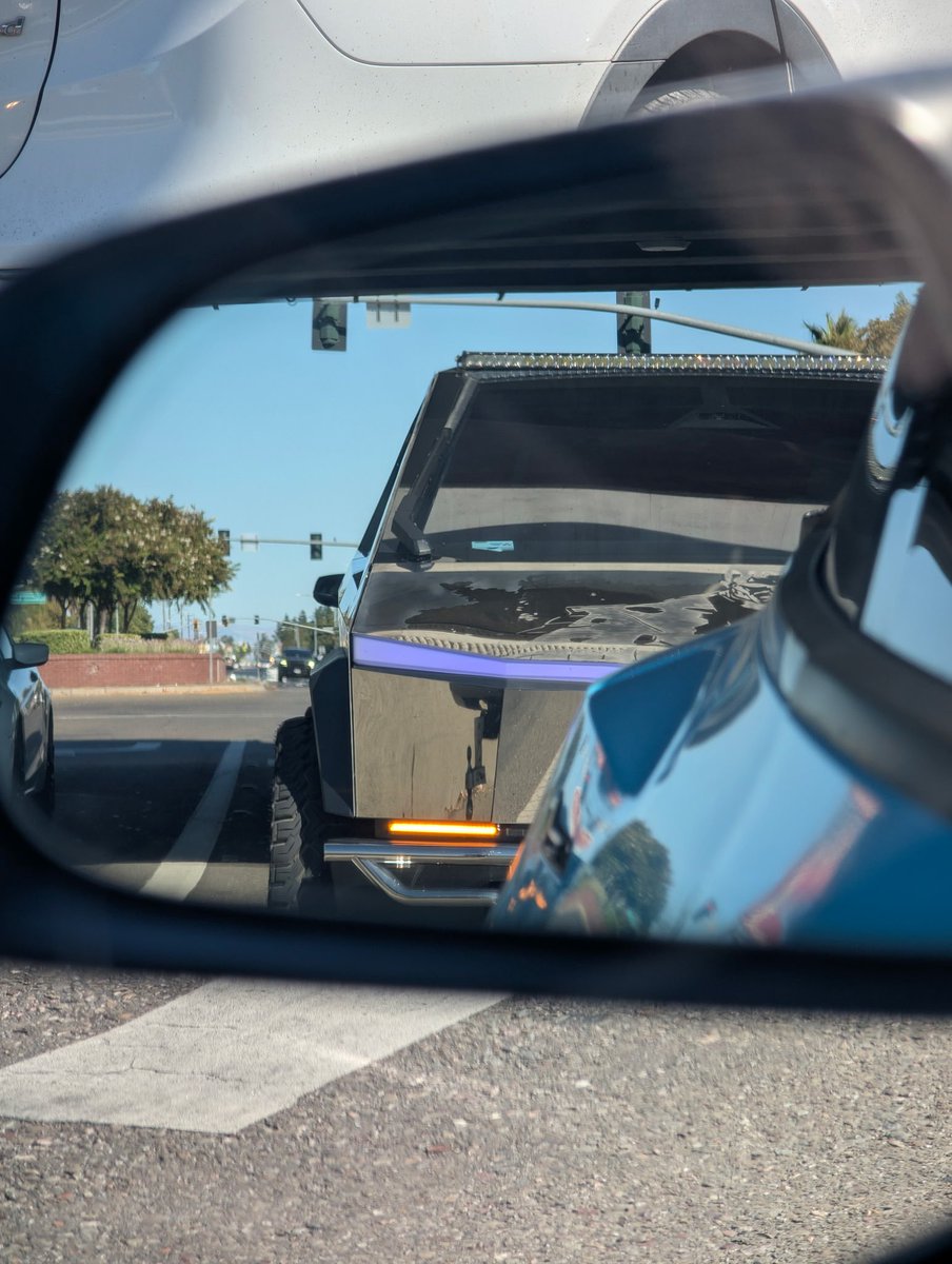 POV I'm behind you in the @theXtakeover convoy 📐 Cybertruck makes the roads look futuristic